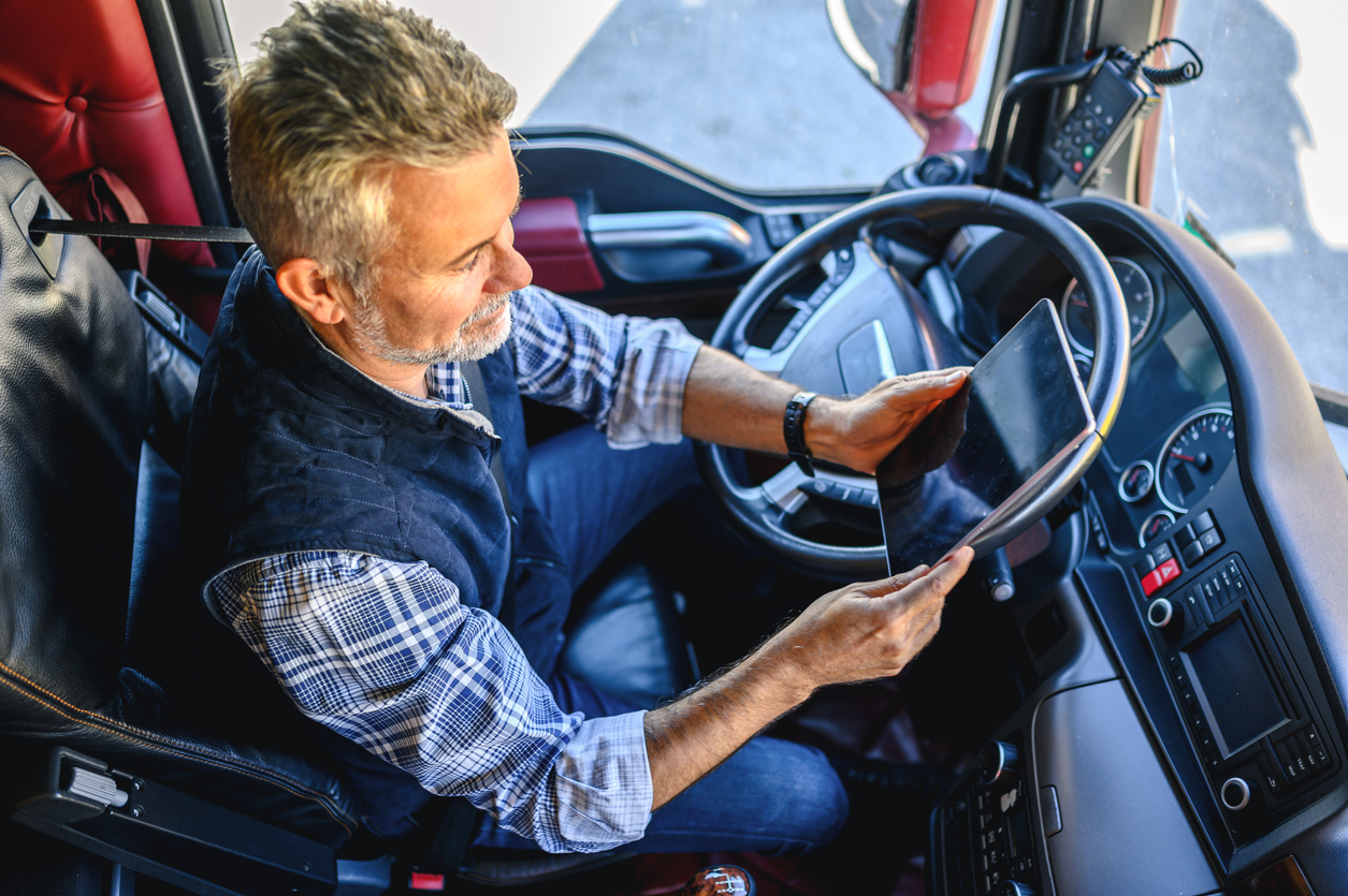 Truck driver using a trucking dashboard software